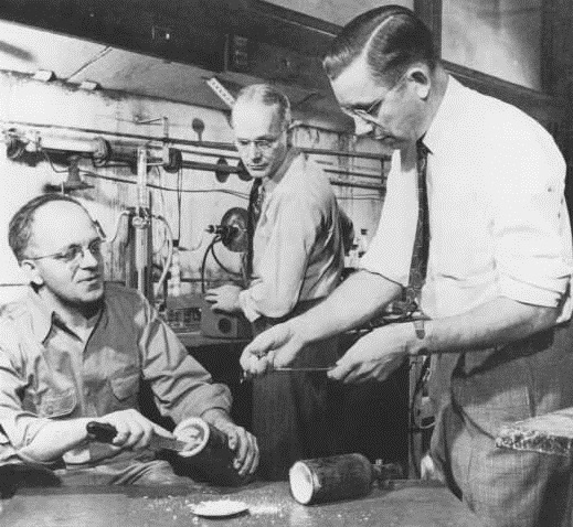 Reenactment of the 1938 discovery of Teflon. Left to right: Jack Rebok, Robert McHarness, and Roy Plunkett